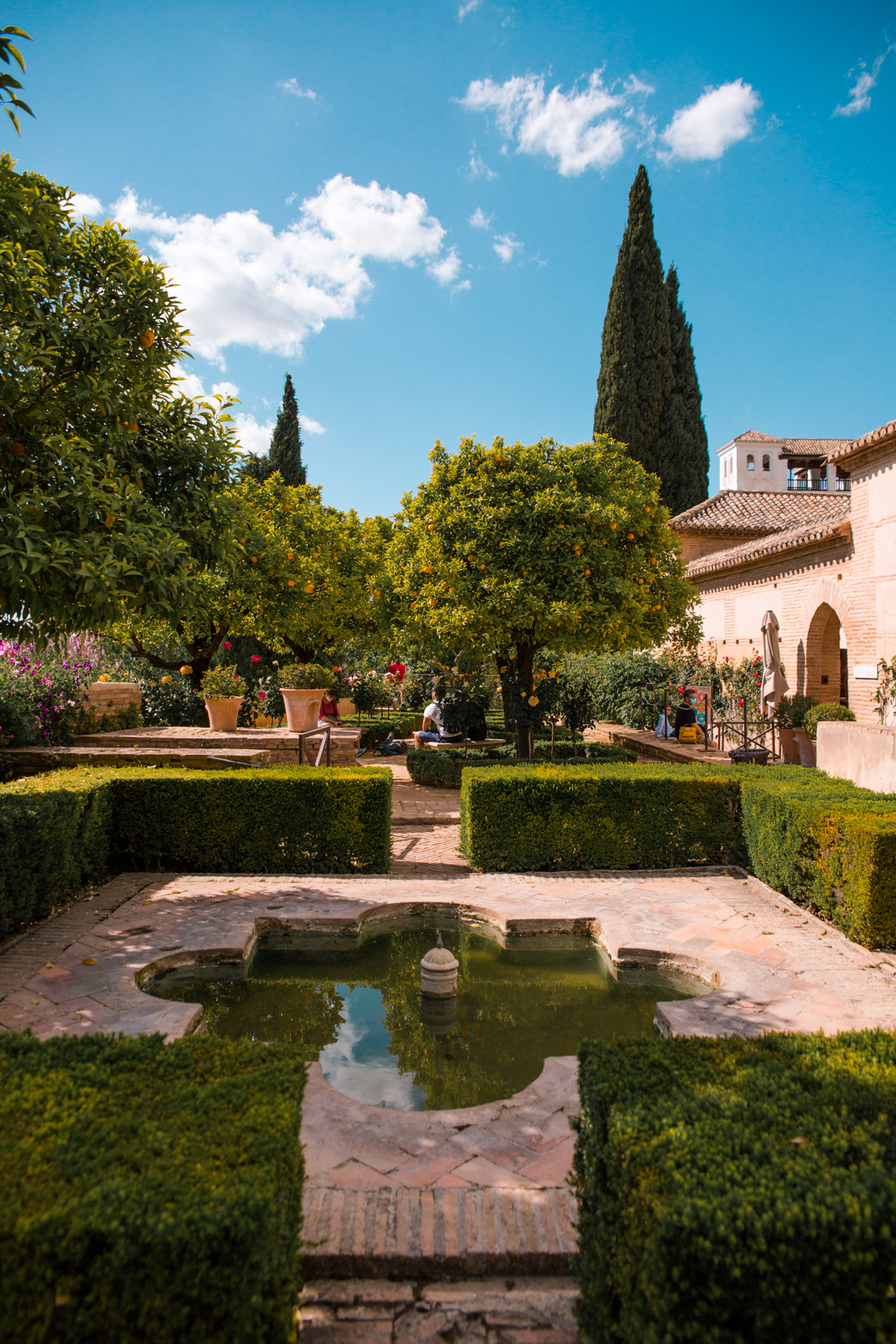 Summer in the gardens of Generalife, next to Palacio de Generalife entrance, in Alhambra Granada, Spain.