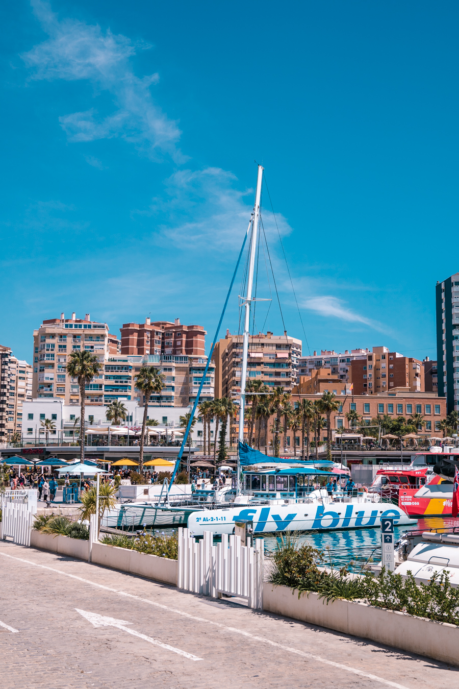 Fly blue catamaran parked in puerto de Malaga