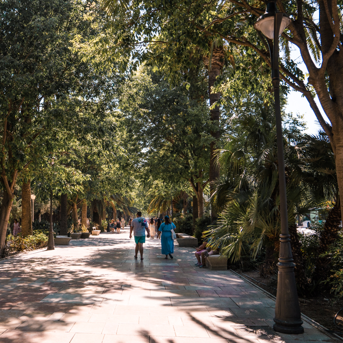 people walking in Malaga park, Spain