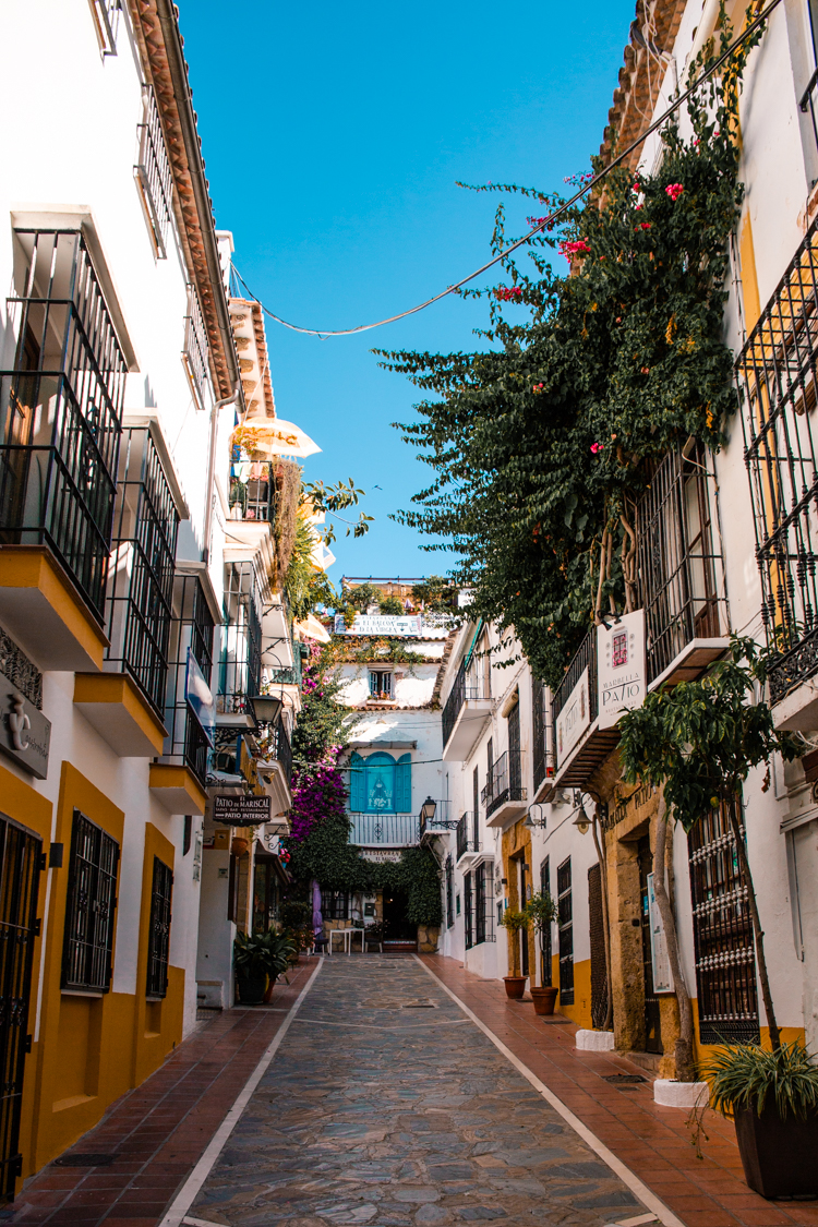 typical andalusian street in marbella old town on costa del sol
