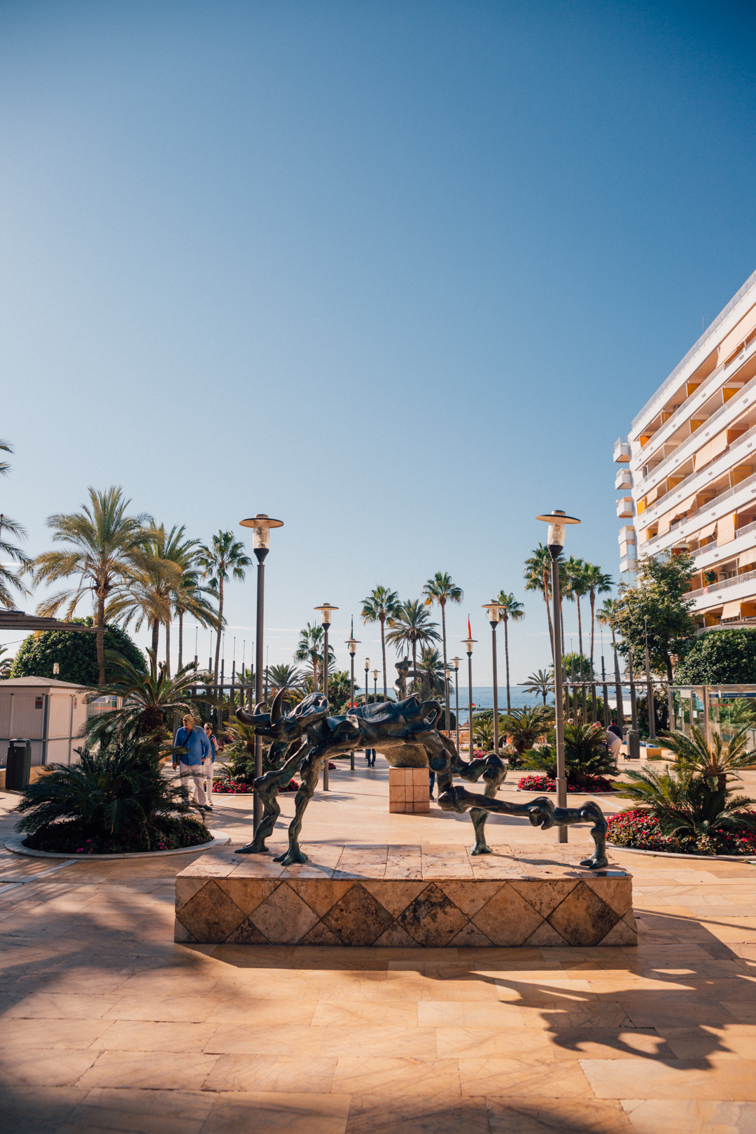promenade with Dahli statues near Parque de la Alameda, Marbella, Spain
