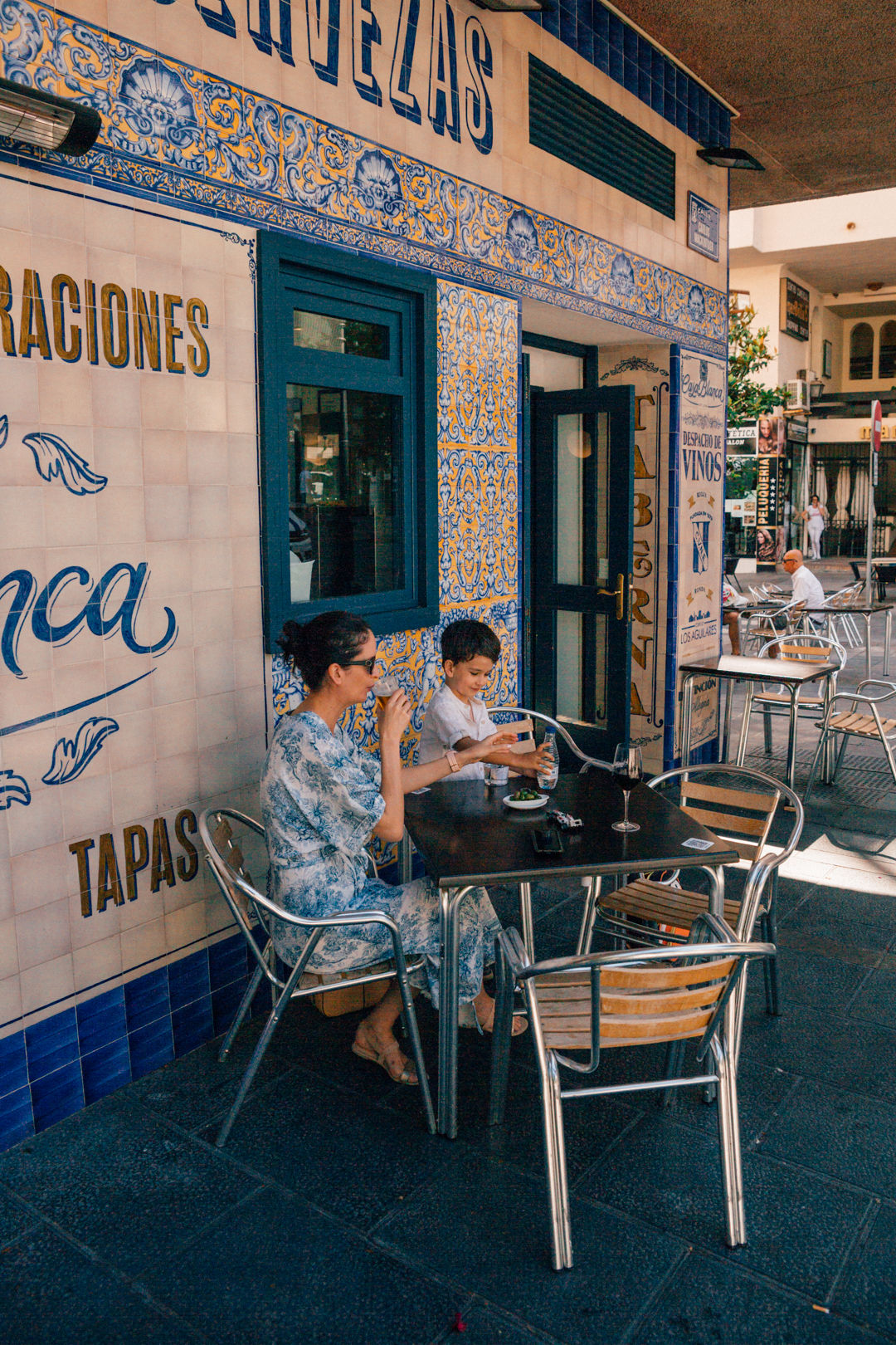 people having drinks at Taverna Casa Blanca in Marbella, Southern Spain