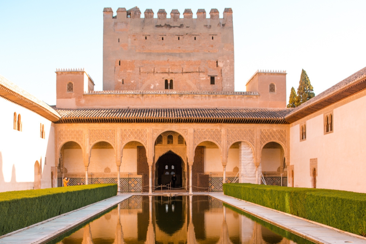 The courtyard with a pond in Nasrid Palace, Alhambra, Granada.