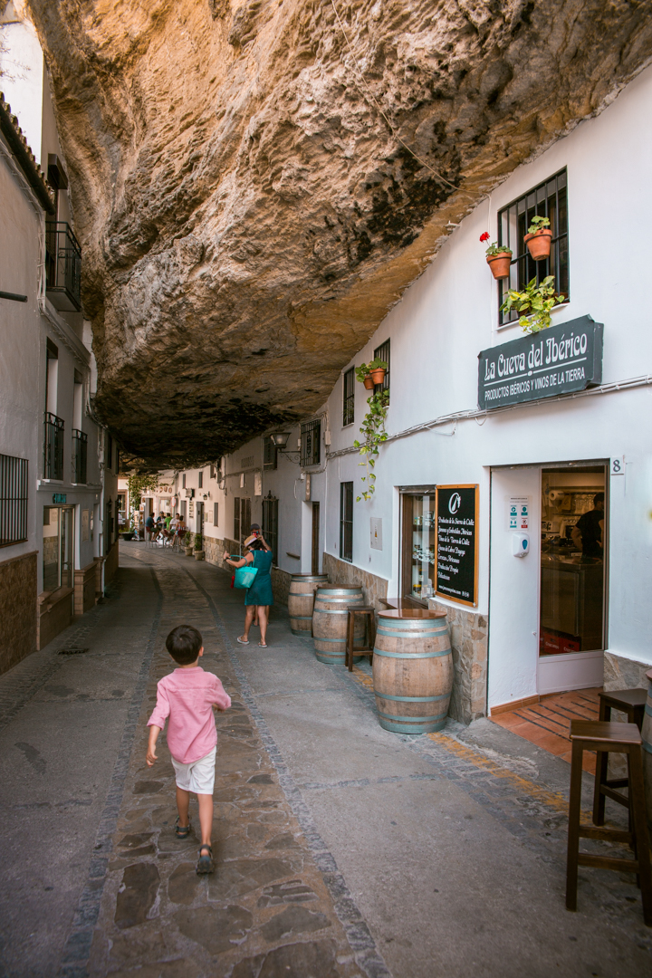 Huge rock formations over a small street in the village of Setenil de las bodegas in Southern Spain