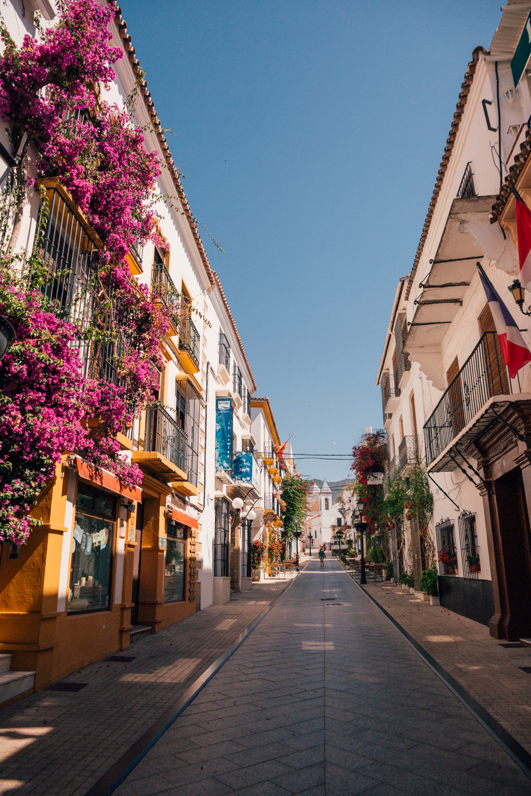 Pretty streets of Marbella old town with blooming flowers, Costa del Sol, Southern Spain