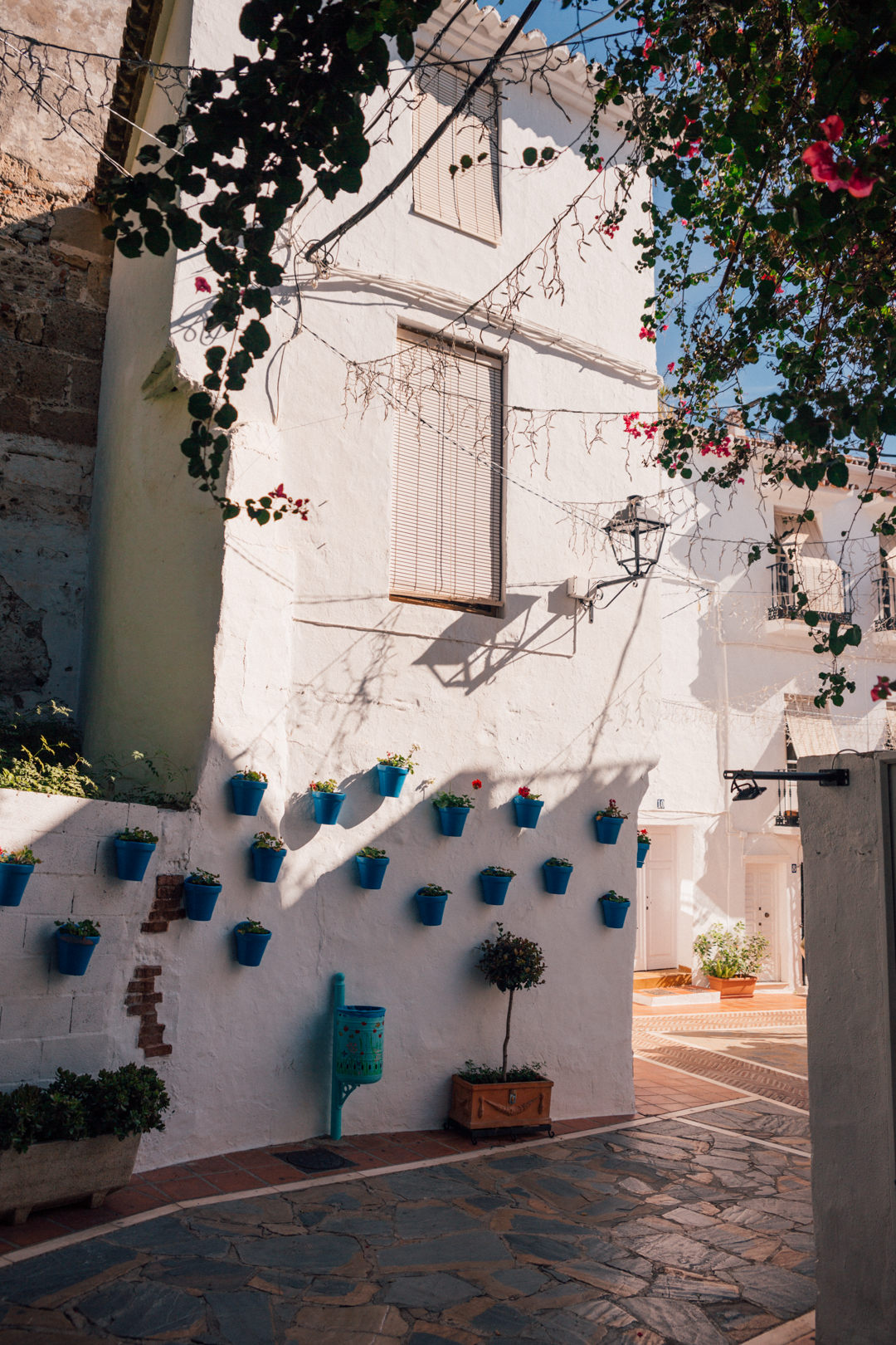 Flower pots on the walls of Marbella old town, southern spain