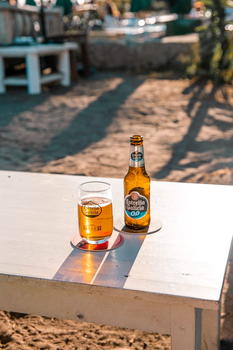 Beer on a beach in Puerto Banus, Marbella.