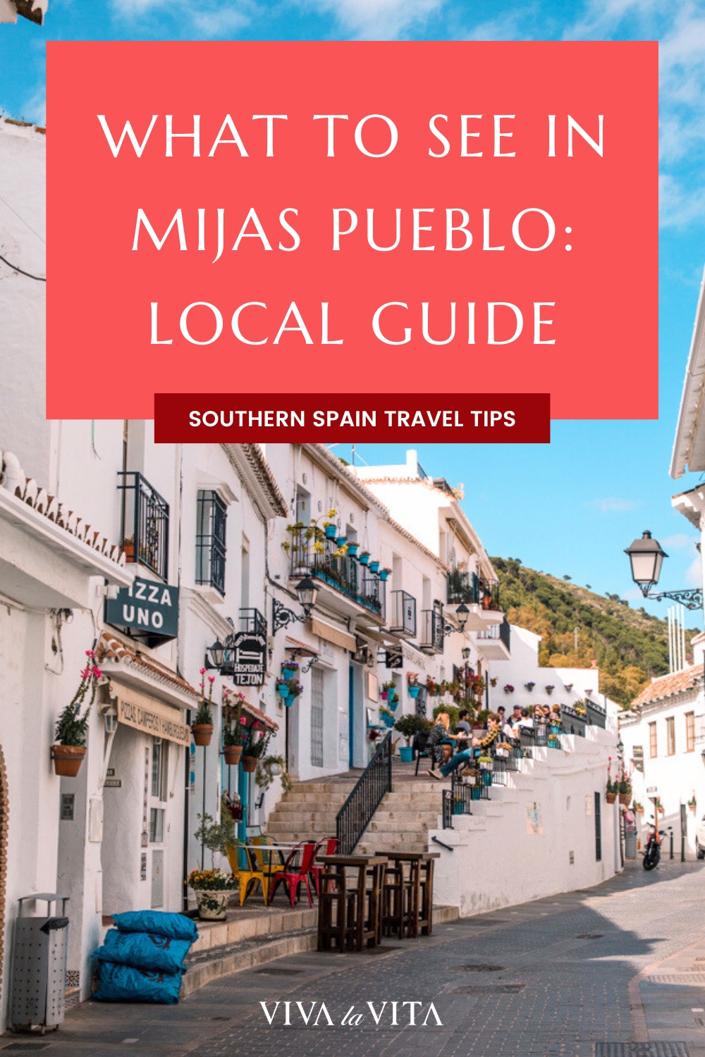 pinterest image showing a street in the village of Mijas pueblo, with a headline reading: what to see in Mijas pueblo: local guide, southern spain travel tips