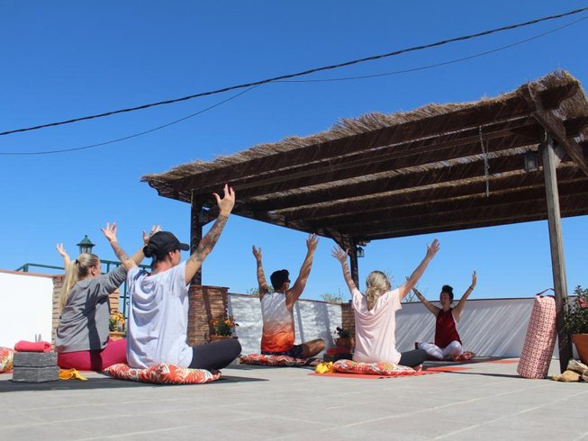 people doing yoga at a yoga retreat in Granada, Spain